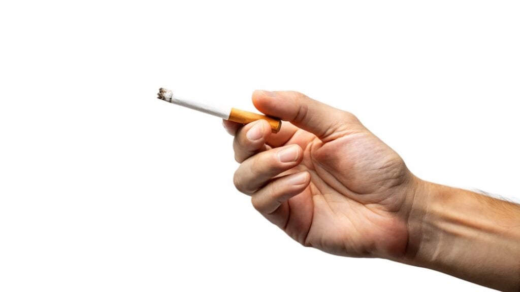 Hand holding cigarette