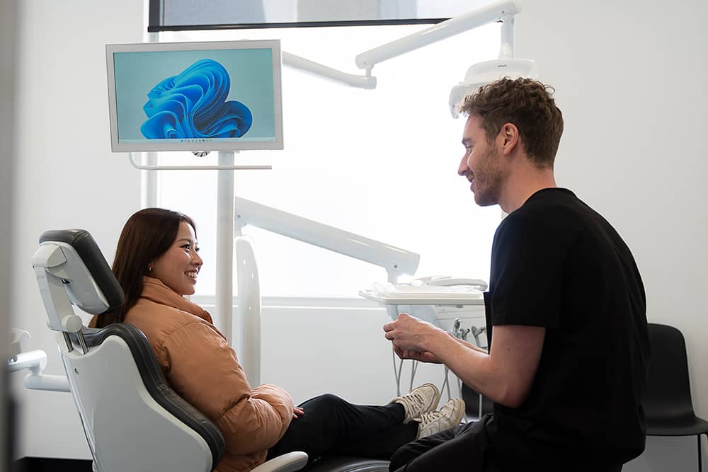 Patient in chair with dentist