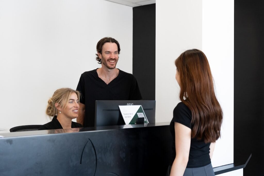 Lady booking teeth whitening appointment with 123 Dental Perth