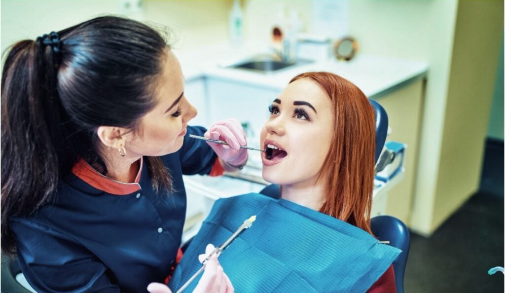 Dentist and patient during a sedation dentistry appointment